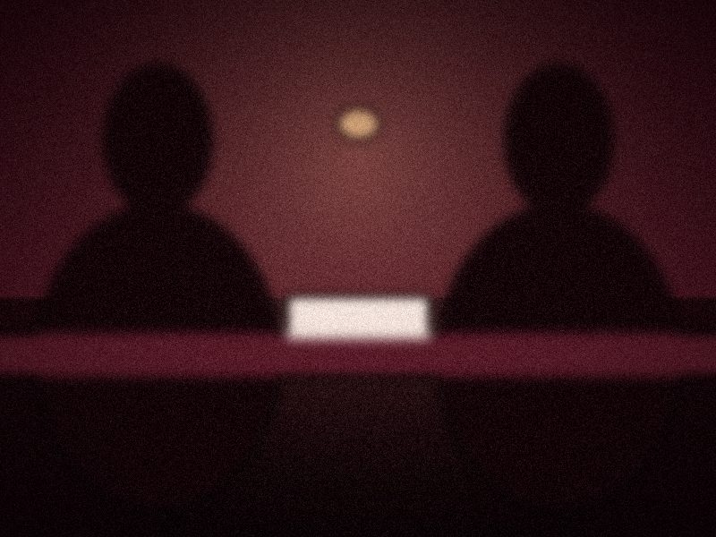 Silhouettes de deux personnes en rendez-vous autour d'une table